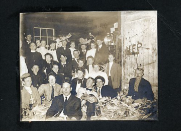 A Group Photograph With Corn Husks